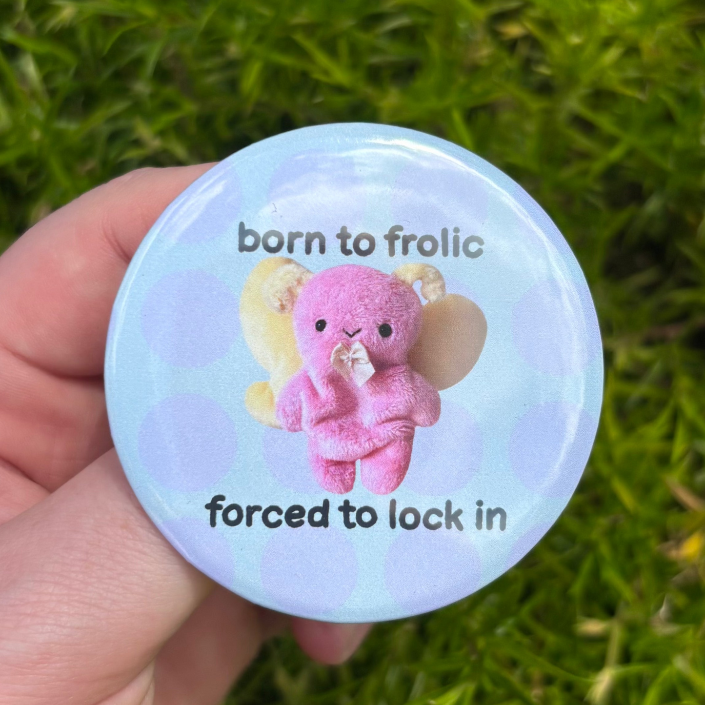 'Born to frolic' button badge
